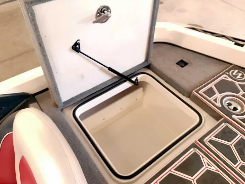 Slide: The Image of Open storage compartment on 2021 Ranger Z519 SC boat deck. - 36