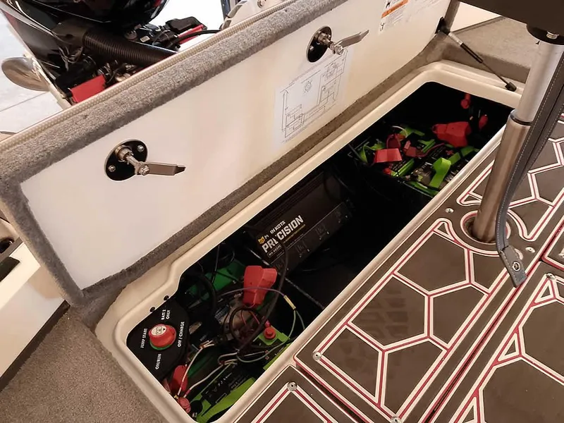 Slide: The Image of 2021 Ranger Z519 SC boat battery compartment with Precision charger and wiring. - 37