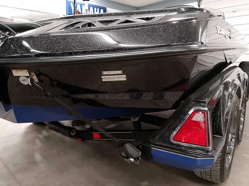 Slide: The Image of 2020 Ranger Z520L Comanche DC boat on trailer, rear view, indoors. - 12