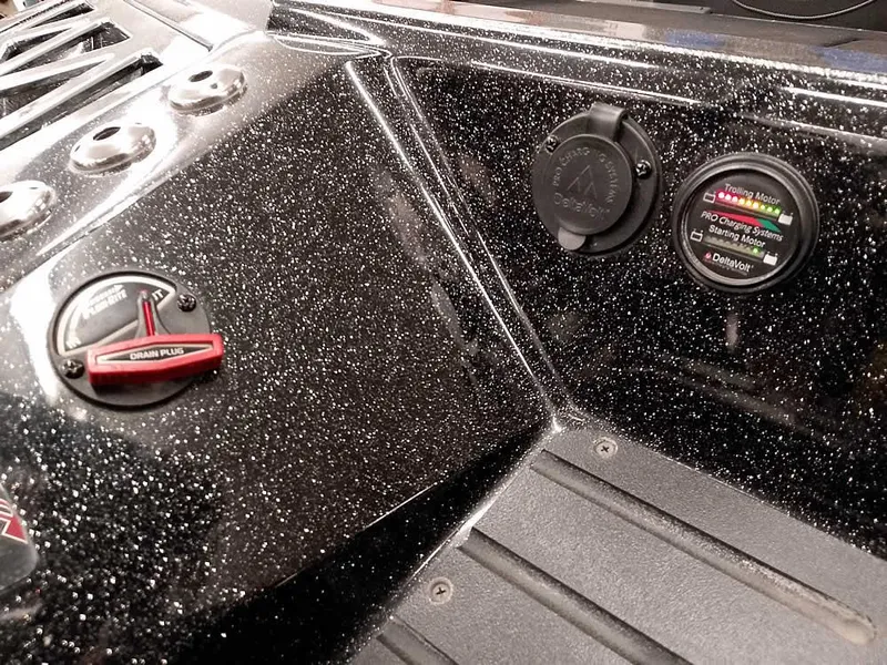 Slide: The Image of Control panel of 2020 Ranger Z520L Comanche DC boat with switches and indicators. - 13