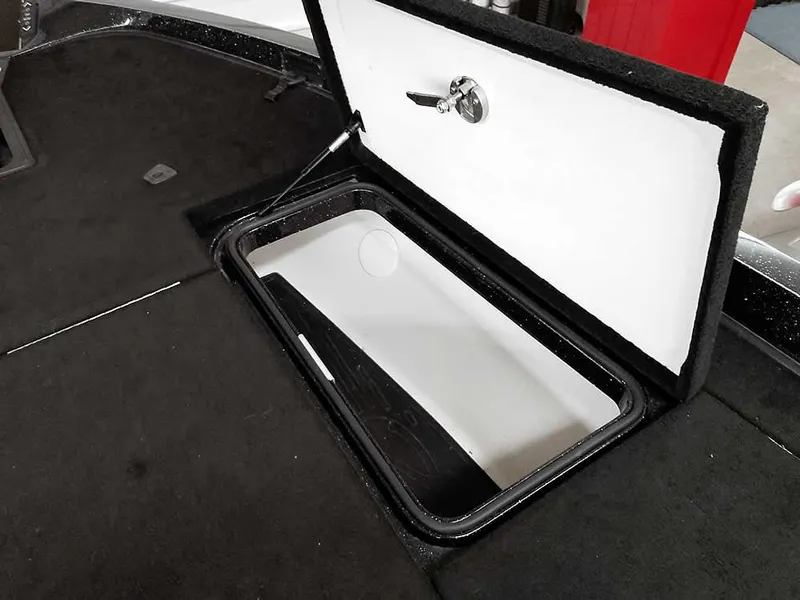 Slide: The Image of 2020 Ranger Z520L Comanche DC storage compartment with open lid, showcasing interior space. - 18