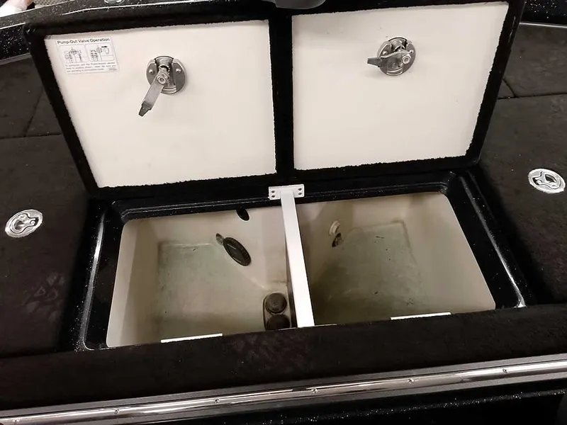 Slide: The Image of 2020 Ranger Z520L Comanche DC livewell compartments with open lids. - 30