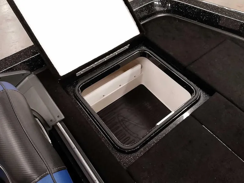 Slide: The Image of 2020 Ranger Z520L Comanche DC storage compartment with open lid, showcasing interior space. - 32
