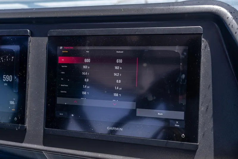 Slide: The Image of Garmin display showing engine data on 2022 Axopar 28 T-Top Brabus boat. - 43