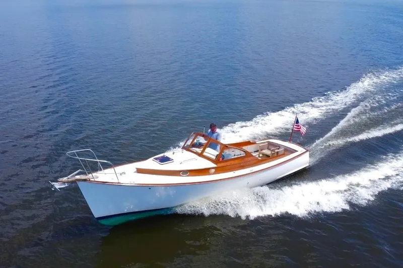 The Image of Custom Eldred Cooper 30 Downeast boat cruising on open water, 2008 model. - 0