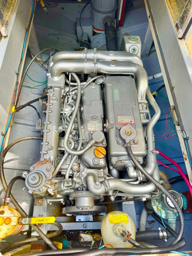 Slide: The Image of Engine of 2008 Custom Eldred Cooper 30 Downeast boat, showcasing intricate mechanical components. - 17