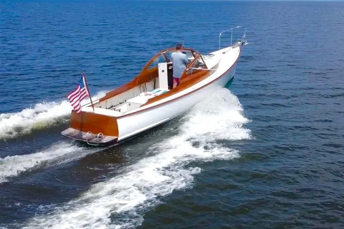 Slide: The Image of Custom Eldred Cooper 30 Downeast boat cruising on open water, 2008 model. - 2