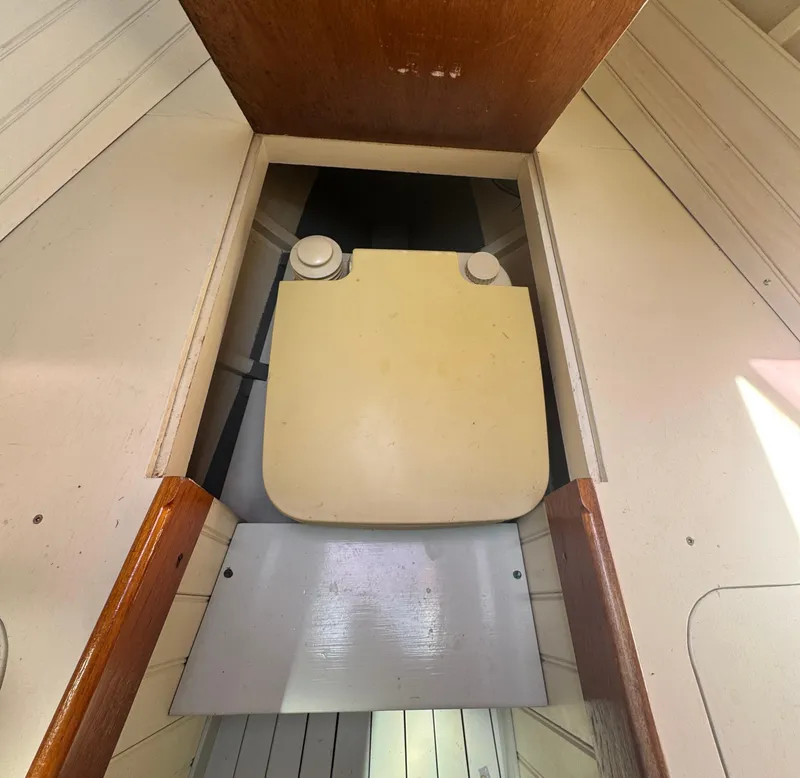 Slide: The Image of Interior view of 2008 Custom Eldred Cooper 30 Downeast boat, featuring a storage compartment. - 22