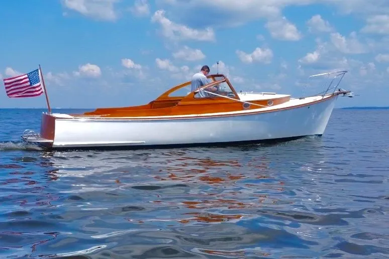Slide: The Image of Custom Eldred Cooper 30 Downeast boat, 2008 model, cruising on calm waters under a blue sky. - 3