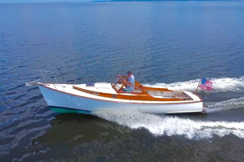 Slide: The Image of Custom Eldred Cooper 30 Downeast boat cruising on open water, 2008 model. - 4