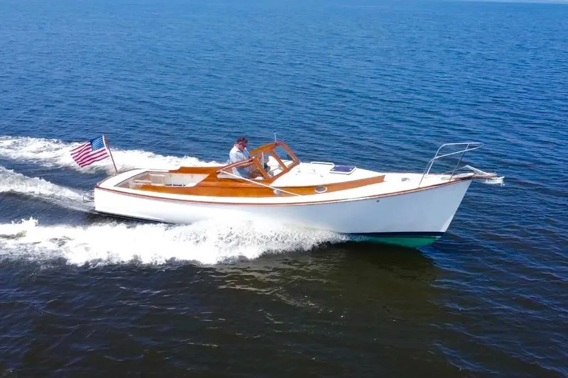 Slide: The Image of Custom Eldred Cooper 30 Downeast boat cruising on open water, 2008 model. - 5