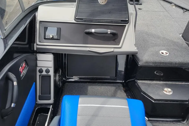 Slide: The Image of 2025 Ranger 2080 Angler boat interior with modern dashboard and seating. - 10