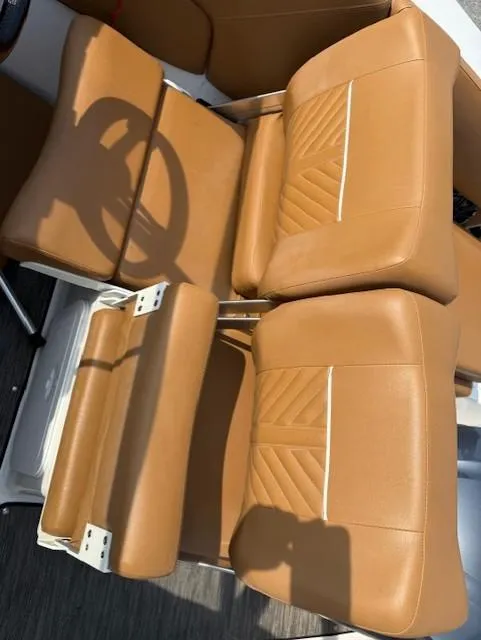 Slide: The Image of 2021 Glastron GTD 240 boat seats, tan leather, stylish design. - 13