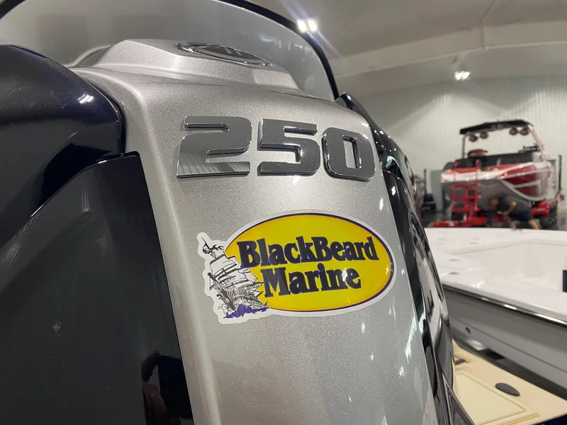 Slide: The Image of 2025 G3 Sportsman 2400 boat engine with BlackBeard Marine sticker, showcasing 250 horsepower. - 4