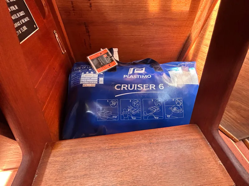 Slide: The Image of Blue Plastimo Cruiser 6 bag inside a 1983 Sabre 38 sailboat cabin. - 26