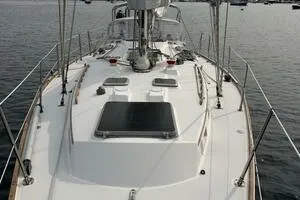 Slide: The Image of 1983 Sabre 38 sailboat deck view on calm water. - 31