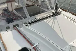 Slide: The Image of 1983 Sabre 38 sailboat deck with rigging and cockpit details. - 34