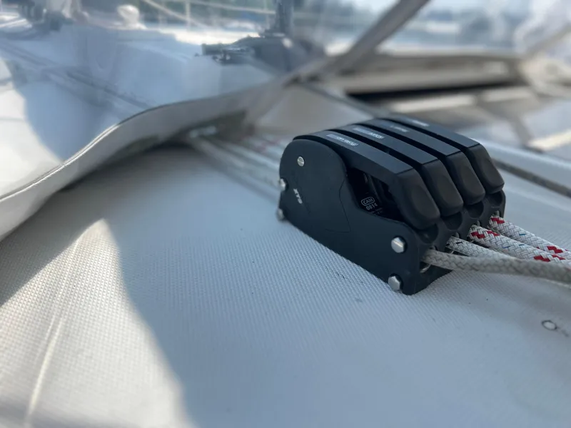 Slide: The Image of Rope clutches on a 1983 Sabre 38 sailboat deck, close-up view. - 38