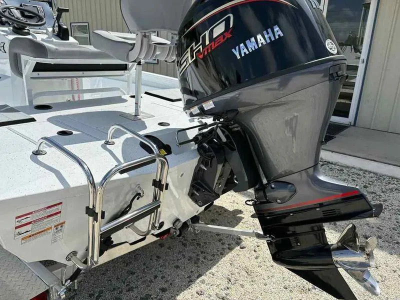 Slide: The Image of 2026 Xpress H190B boat with Yamaha SHO VMAX outboard motor and ladder. - 7