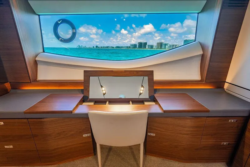 Slide: The Image of Luxurious interior of 2021 Princess S78 yacht with ocean view through large window. - 40