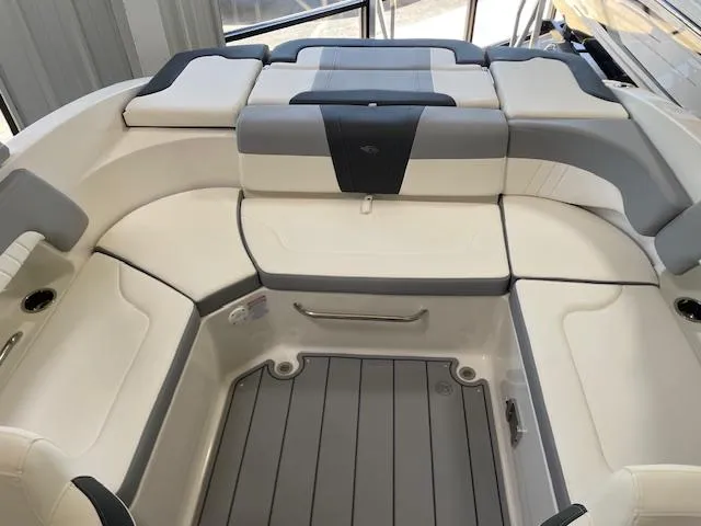Slide: The Image of 2026 Chaparral 23 SSi boat interior with modern dashboard and steering wheel. - 5