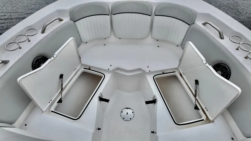 Slide: The Image of 2023 Sea Fox 226 Traveler boat interior with open storage compartments and seating. - 20