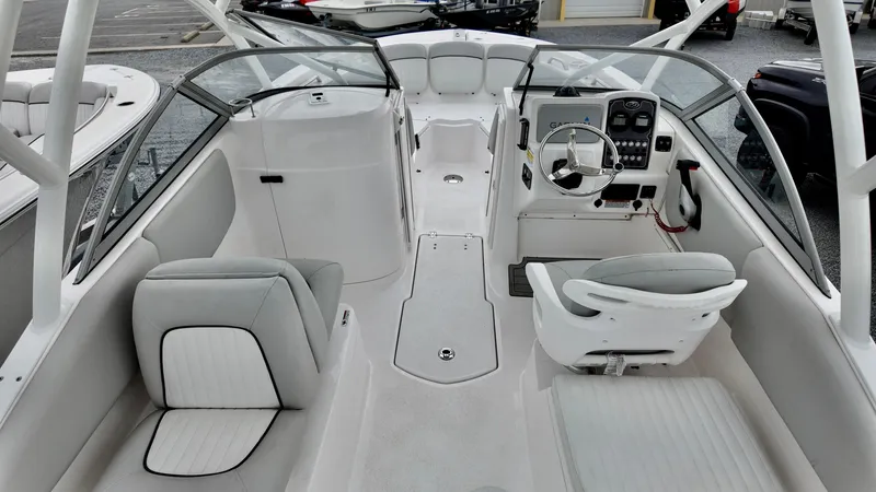 Slide: The Image of 2023 Sea Fox 226 Traveler boat interior with modern seating and steering console. - 22