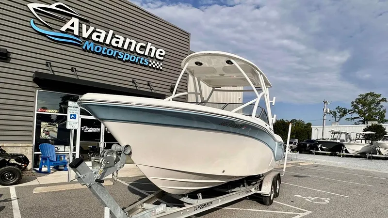 Slide: The Image of 2023 Sea Fox 226 Traveler boat on trailer at Avalanche Motorsports dealership. - 4