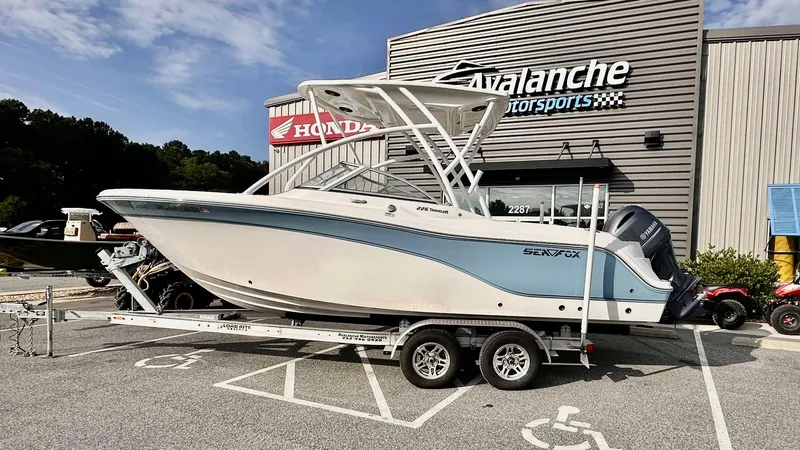 Slide: The Image of 2023 Sea Fox 226 Traveler boat on trailer at dealership. - 6