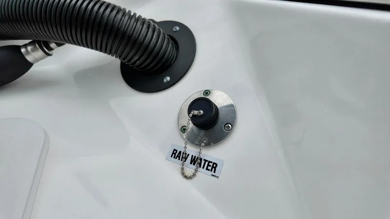 Slide: The Image of 2023 Sea Fox 226 Traveler raw water intake with hose connection. - 9