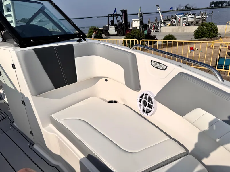 Slide: The Image of 2025 Chaparral 23 SSi boat interior with sleek seating and modern design. - 10