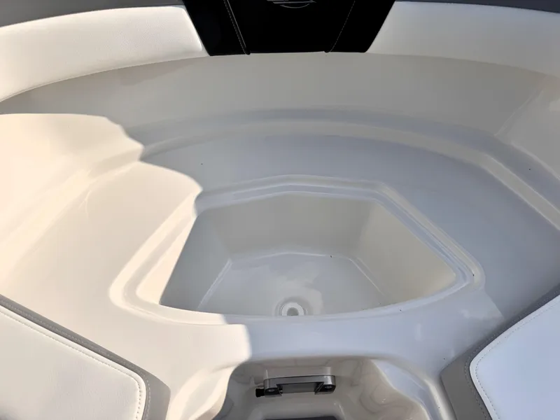 Slide: The Image of 2025 Chaparral 23 SSi boat interior, featuring sleek white seating and modern design. - 20