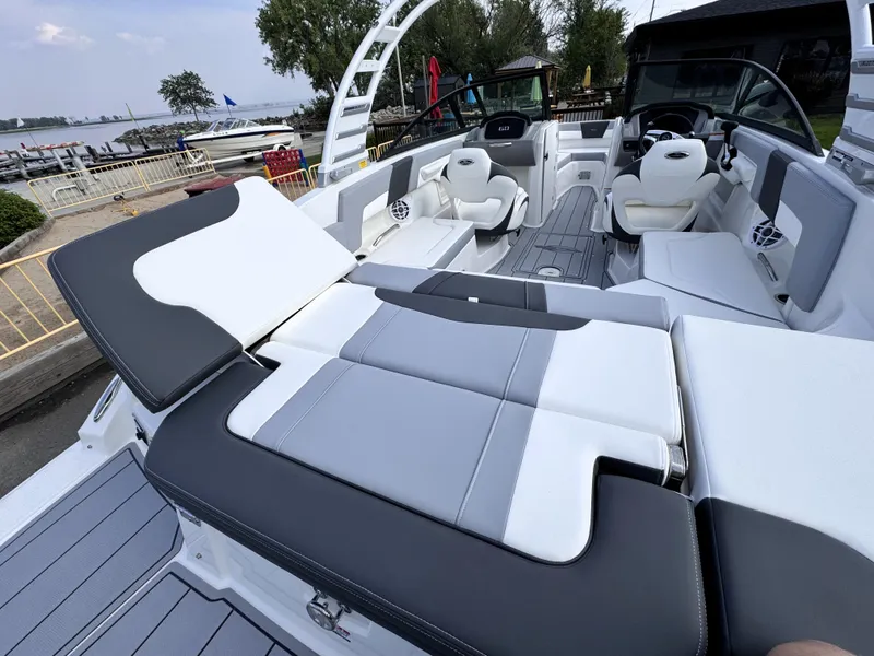 Slide: The Image of 2025 Chaparral 23 SSi boat interior with sleek seating and modern design. - 27