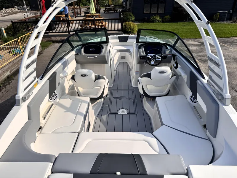 Slide: The Image of 2025 Chaparral 23 SSi boat interior with modern seating and sleek design. - 6