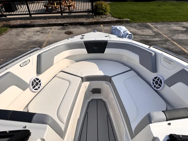Slide: The Image of 2025 Chaparral 23 SSi boat interior with spacious seating and modern design. - 9