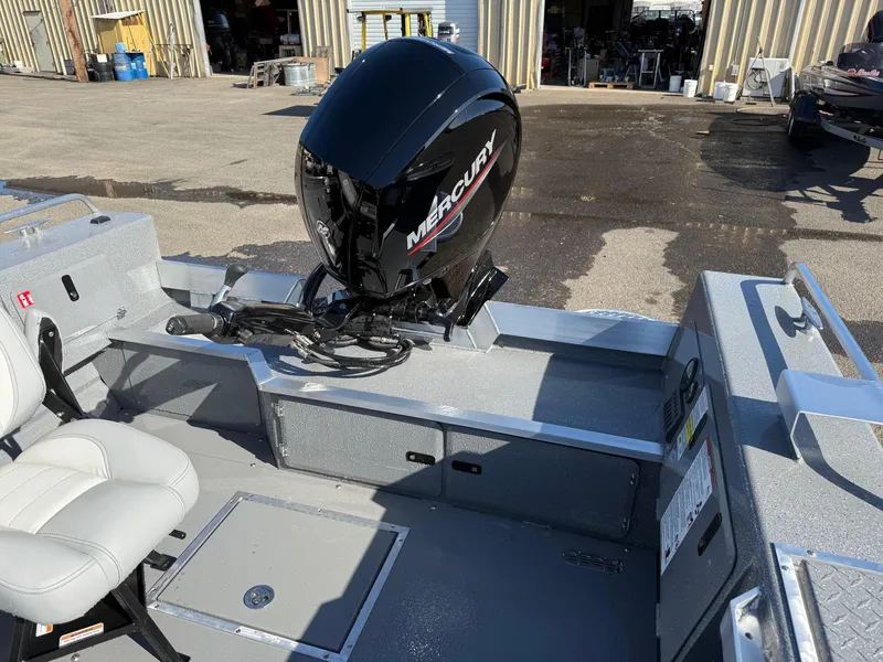 Slide: The Image of 2025 Thunder Jet 209 Rush OT boat with Mercury engine, featuring sleek interior design. - 7