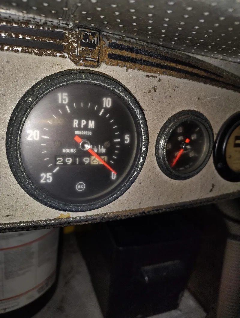 Slide: The Image of Close-up of 1982 Hatteras 61 Motor Yacht RPM gauge showing 2919.6 hours. - 31