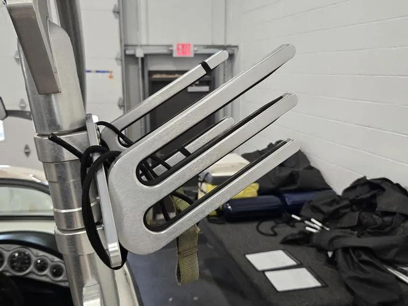 Slide: The Image of Wakeboard rack on a 2007 MasterCraft X1 boat in a garage setting. - 37