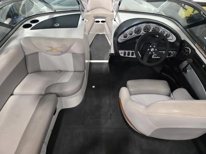 Slide: The Image of 2007 MasterCraft X1 boat interior with seating and dashboard view. - 41