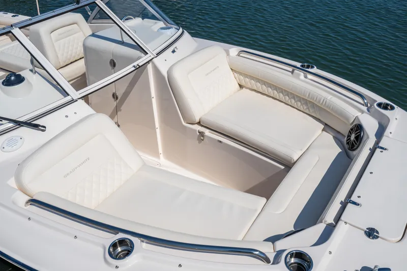 Slide: The Image of 2026 Grady-White 215 Freedom boat with luxurious seating and sleek design on the water. - 5
