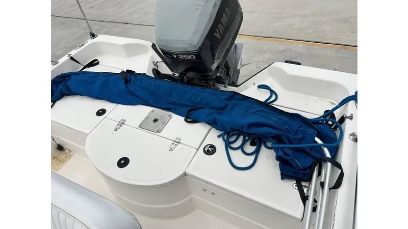 Slide: The Image of 2001 Skeeter 2200 ZX boat with Yamaha outboard motor and blue cover. - 5