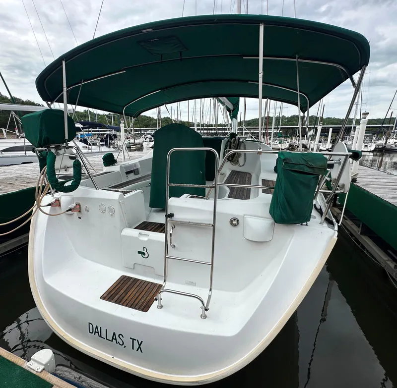 Slide: The Image of 2004 Beneteau 393 sailboat docked, green canopy, Dallas, TX. - 7