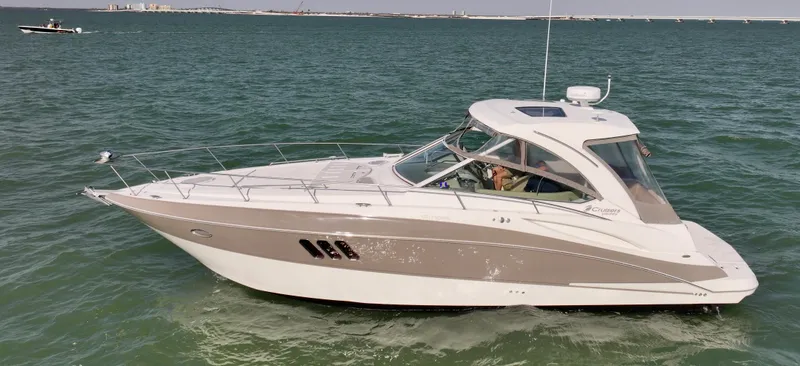 Slide: The Image of 2009 Cruisers Yachts 360 Express on open water, side view. - 15