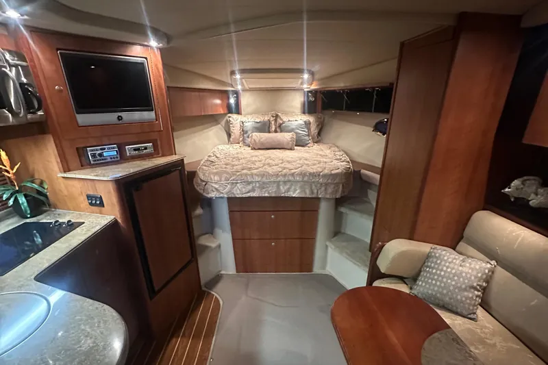 Slide: The Image of Luxurious interior of 2009 Cruisers Yachts 360 Express with cozy bed and modern amenities. - 39