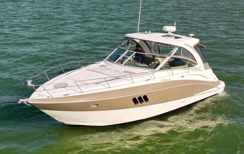 The Image of 2009 Cruisers Yachts 360 Express on open water, showcasing sleek design and luxury features. - 0