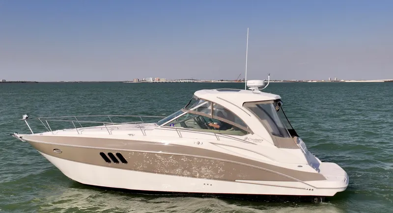 Slide: The Image of 2009 Cruisers Yachts 360 Express on open water, side view. - 3