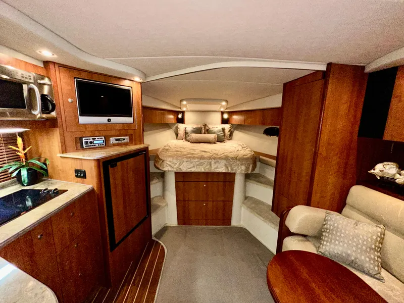 Slide: The Image of Luxurious interior of 2009 Cruisers Yachts 360 Express with cozy bed and modern amenities. - 38