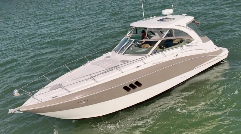 Slide: The Image of 2009 Cruisers Yachts 360 Express on open water, sleek design, luxury boating experience. - 8