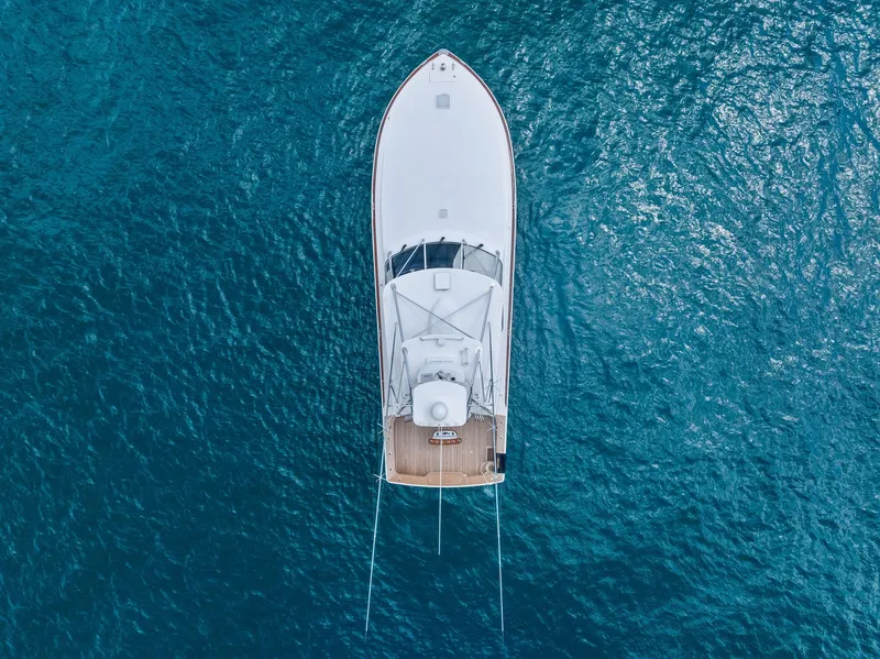 Slide: The Image of Aerial view of 2010 Viking 52 Open yacht on blue ocean water. - 13