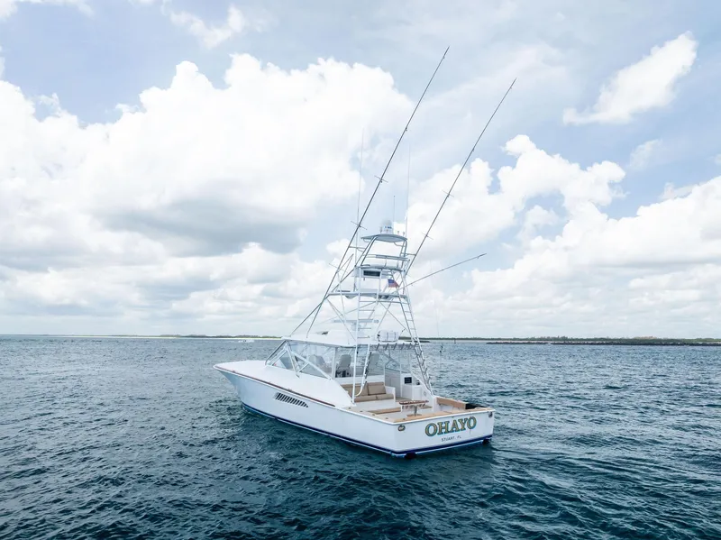 Slide: The Image of 2010 Viking 52 Open yacht on open sea under cloudy sky. - 14